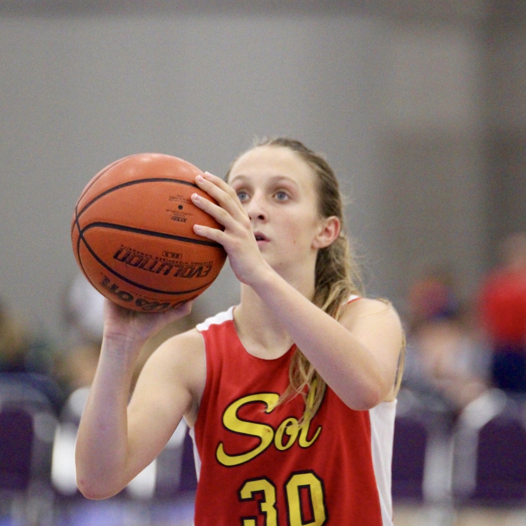 Sadie shooting free throw in the gym